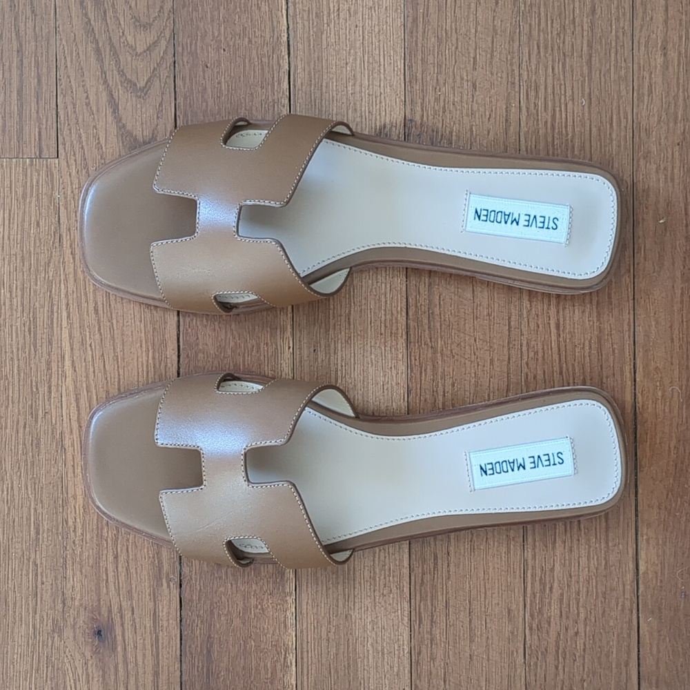 Brand new in box. Steve Madden slides size 9